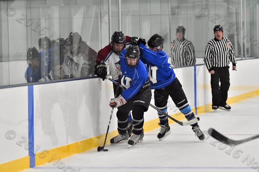 Wheaton College Men\'s Ice Hockey vs Middlesex Community College. - Photo By: KEITH NORDSTROM